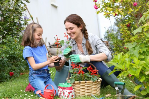 Team of gardeners preparing to work in a residential garden